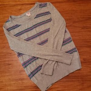 Gray sweater with colorful detail